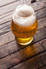 Small glass of light beer