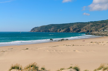Costal view of Praia do Guincho (Guincho Beach) located on Estoril coast near the town of Cascais,...