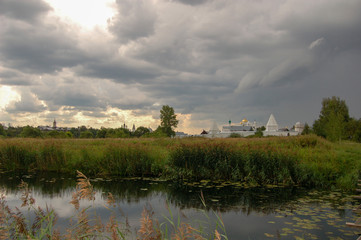 Fototapeta na wymiar View of the river and the old monastery. Suzdal, Russia