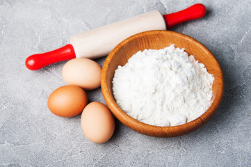 Baking ingredients - flour, eggs and pin