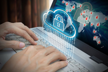 Businessman use Laptop with interface of padlock and cloud computing