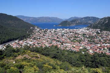 Fototapeta na wymiar Woman and child.Backpack tourism.Campaign.Forest.Sea landscape.Icmeler.Marmaris.Turkey