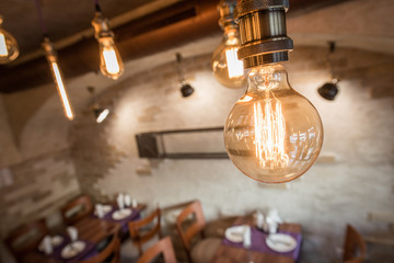 Fototapeta na wymiar Old vintage chandelier in restaurant interior