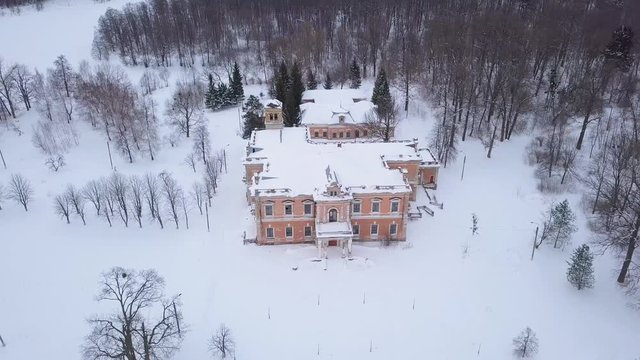 Aerial view of the old abandoned estate in the desert winter landscape