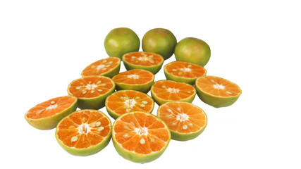 Fresh oranges cut in half for squeezing for juice isolated on white background
