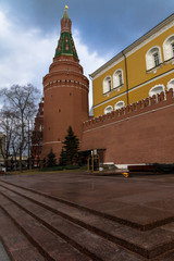 Red wall and tower of the Moscow Kremlin, vertical view. Moscow 2018.