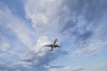 cloudy sky with airplane