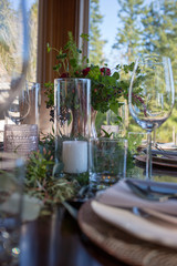 Gorgeous table set with glasses and candles.