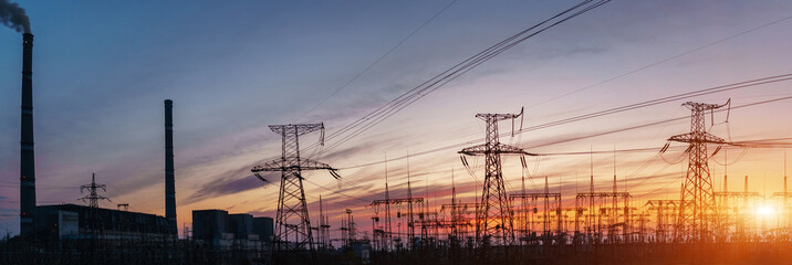 Thermal power stations and power lines during sunset