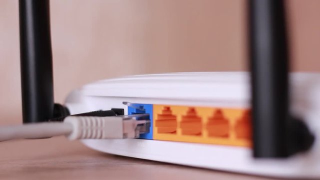 Inserting internet cable to wan nest of router