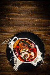 Stuffed chicken fillets and vegetables