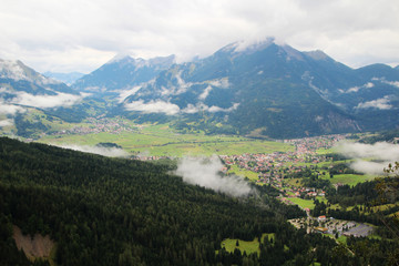 Obraz premium The view of Ehrwald from the hiking trail to Seebensee, Austria