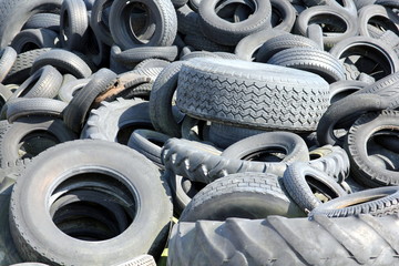 Close-up of a scrap tyre dump