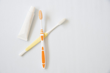 Toothbrush with toothpaste on white background.