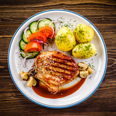 Grilled beefsteak with boiled potatoes and vegetables