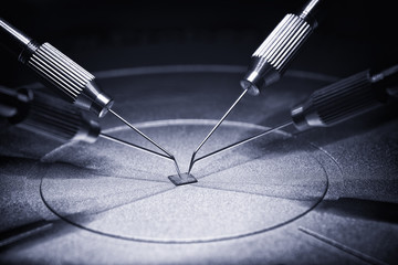 manufacture of chips on a printed circuit board under a microscope