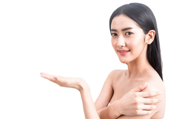 Beautiful young woman showing open hand palm presenting with copy space for product isolated on white background