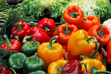 Colorful green, red and yellow peppers paprika.