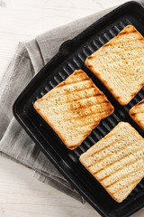 Toasts on the grill. top view. Copyspace