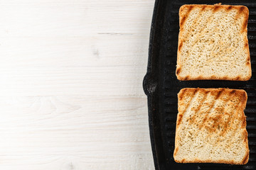 Toasts on the grill. top view. Copyspace