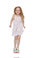 Naklejka premium Little girl is jumping.