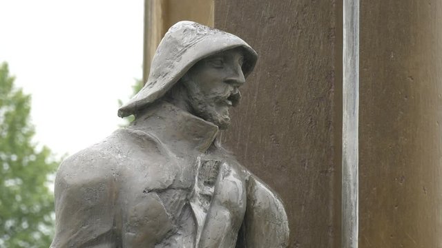 Man statue at the 'T Zand fountain in Bruges