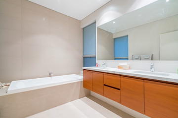 Fototapeta na wymiar Large modern bathroom interior with luxury fittings.