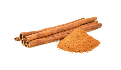 Cinnamon sticks and powder on white background