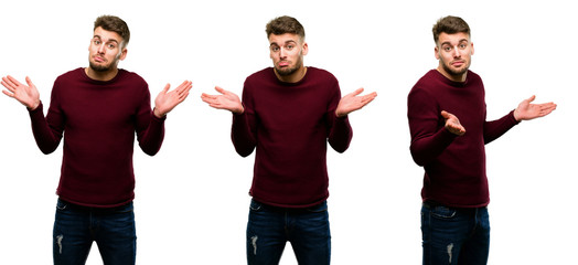 Handsome blond man doubt expression, confuse and wonder concept, uncertain future isolated over...
