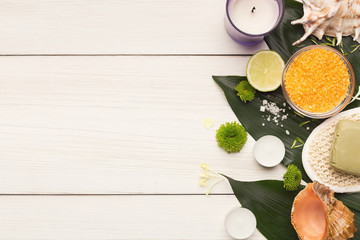 Spa background with facial mask and cream on white wood