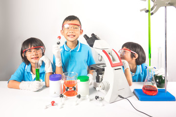 Soft happy kids on playing and learning laboratory in science lab 