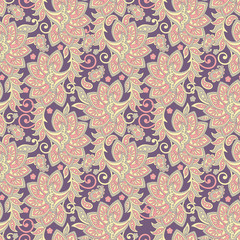 Paisley ethnic seamless pattern with floral elements.