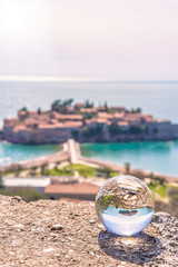 Sveti Stefan reflected in a glass ball