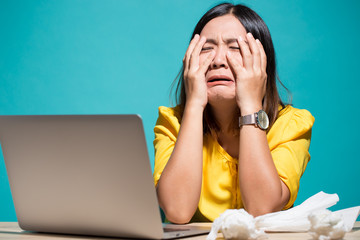 Woman so sad when she look at laptop