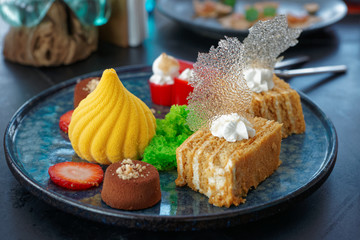 Desserts on marble plate