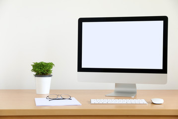 computer screen PC and White Coffee Cup for business on the table