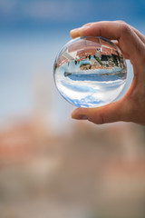 Budva reflected in a crystal ball
