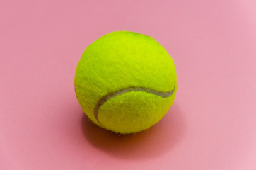 tennis ball pastel paper pink background