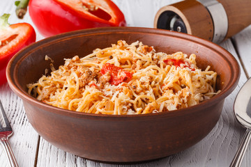 Pasta bake with whole wheat penne, tomatoes and mozarella
