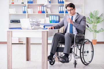 Disabled businessman working in the office