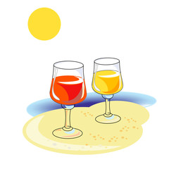 glasses on the sand by the sea
