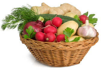 Vegetables in basket isolated on white background