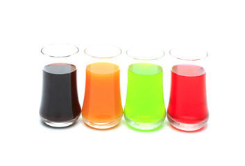 orange , apple , grape and strawberry juice in glass on white background