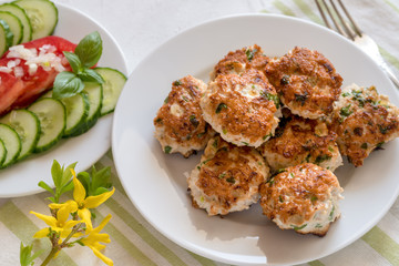 Fried minced turkey cutlets on a plate.