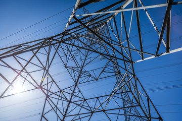 Fototapeta premium High voltage electrical pylons ruling the sky.