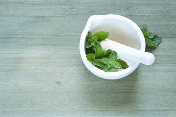 Basil leaves in mortar