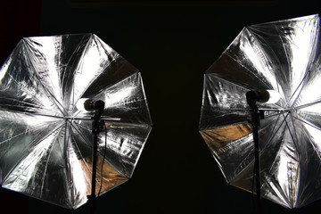 reflective shiny umbrella with the included energy-saving lamp for shooting in photo studio