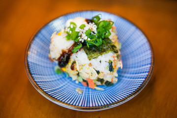 Triangle shaped rice with seaweed sushi