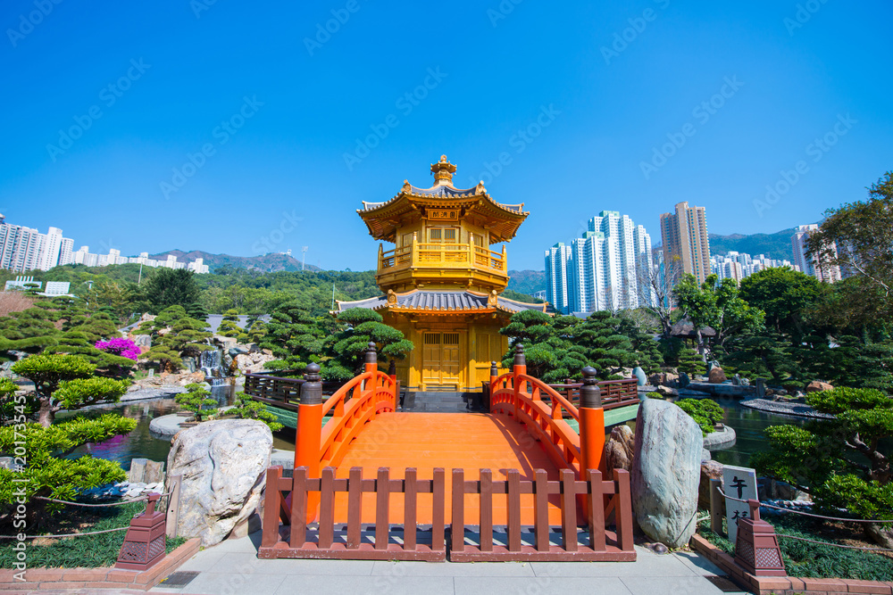 Wall mural The golden pavilion and red bridge at Nan Lian garden, Hong Kong