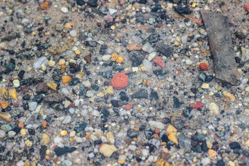 The bottom of the lake, the texture of stones and sand